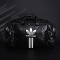 balenciaga-x-adidas-large-duffel-travel-bag-black-with-trefoil-logo-and-triple-stripes Handle
