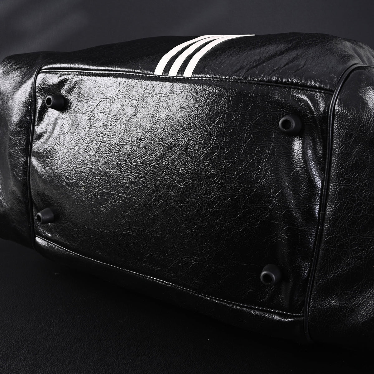 balenciaga-x-adidas-large-duffel-travel-bag-black-with-trefoil-logo-and-triple-stripes Handle