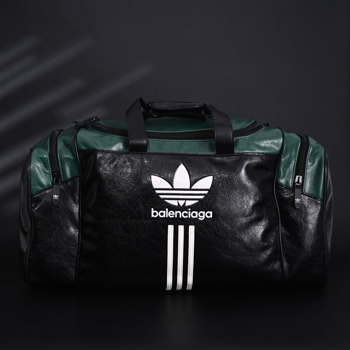 balenciaga-x-adidas-large-duffel-travel-bag-black-green-with-trefoil-logo-and-triple-stripes Handle