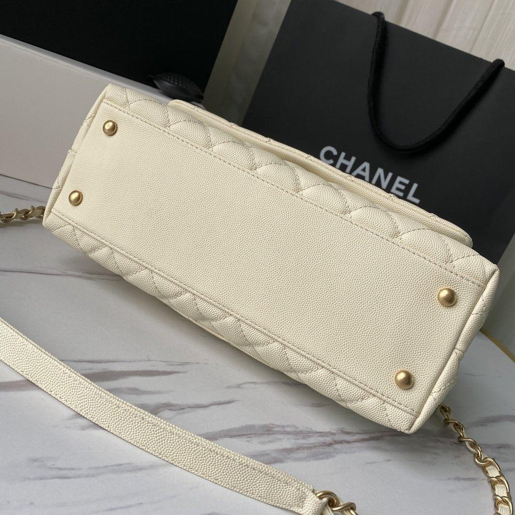 flap-bag-with-top-handle-1 Handle