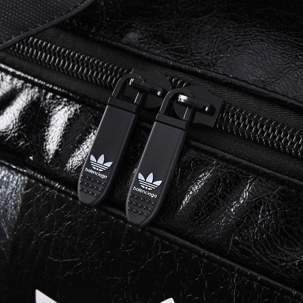 balenciaga-x-adidas-large-duffel-travel-bag-black-with-trefoil-logo-and-triple-stripes Handle
