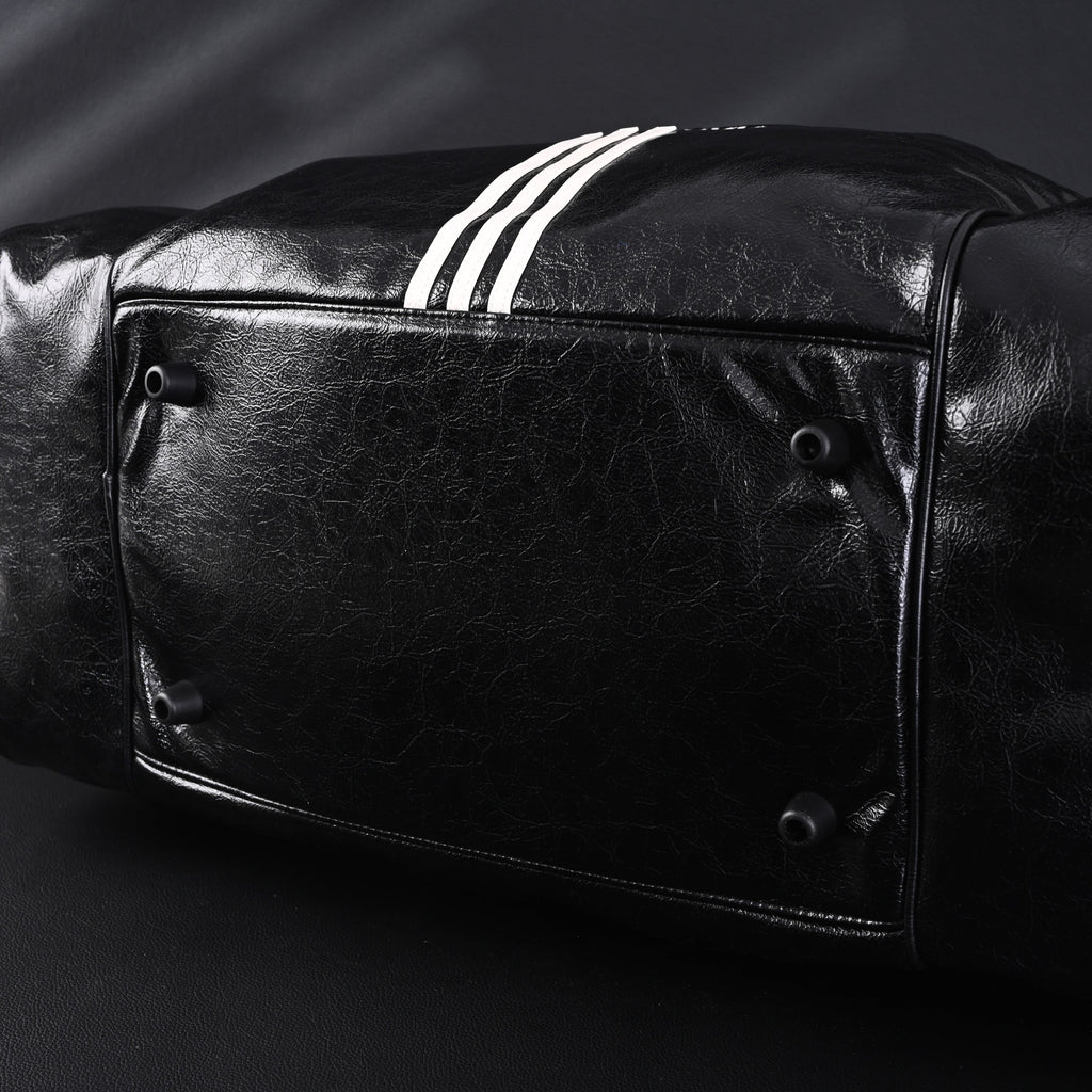 balenciaga-x-adidas-large-duffel-travel-bag-black-green-with-trefoil-logo-and-triple-stripes Handle