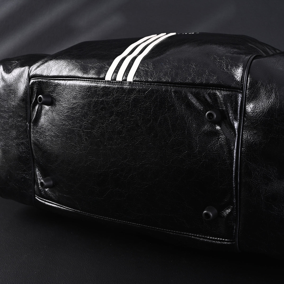 balenciaga-x-adidas-large-duffel-travel-bag-black-green-with-trefoil-logo-and-triple-stripes Handle
