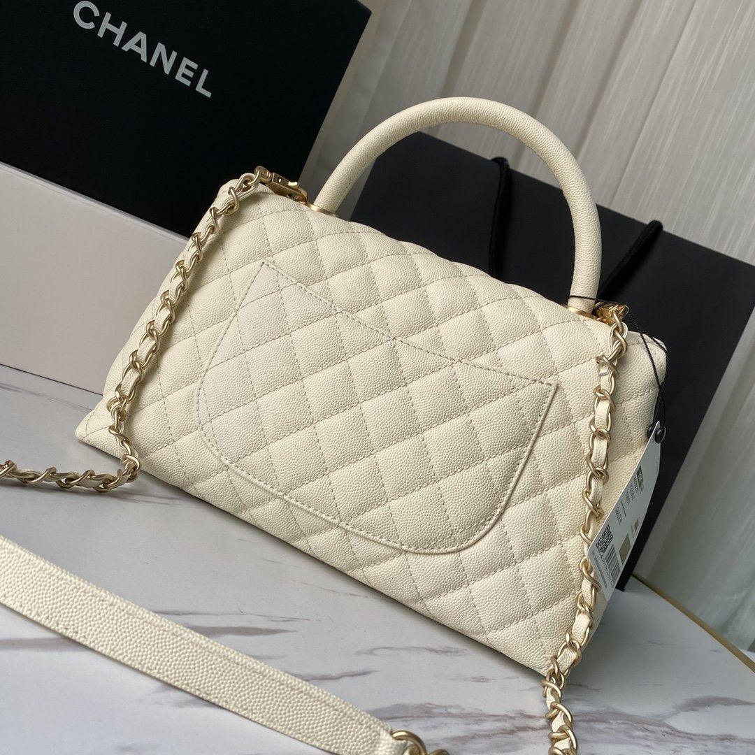 flap-bag-with-top-handle-1 Handle