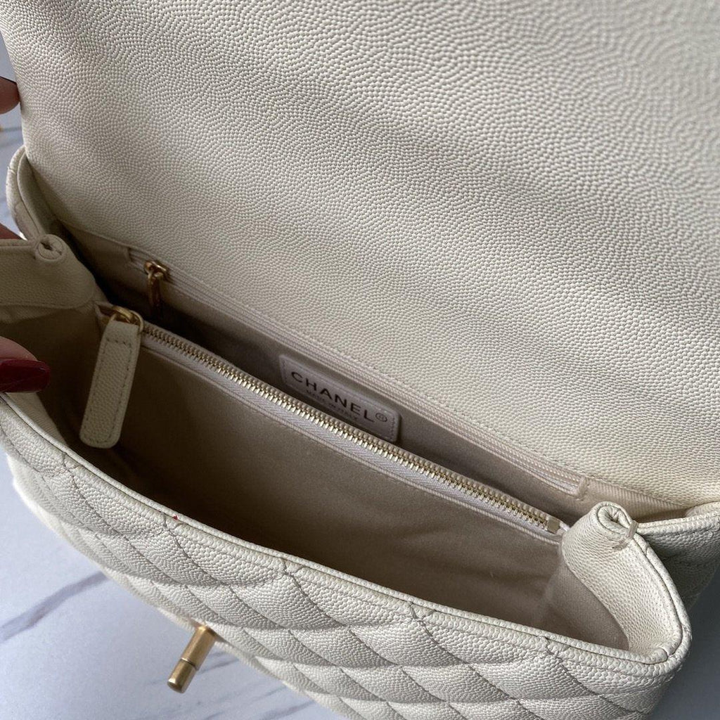 flap-bag-with-top-handle-1 Handle