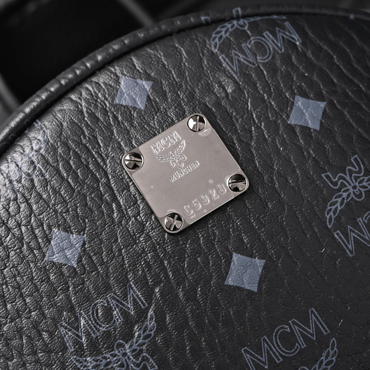 mcm-stark-visetos-medium-backpack-black-monogram-with-studded-detailing ohter