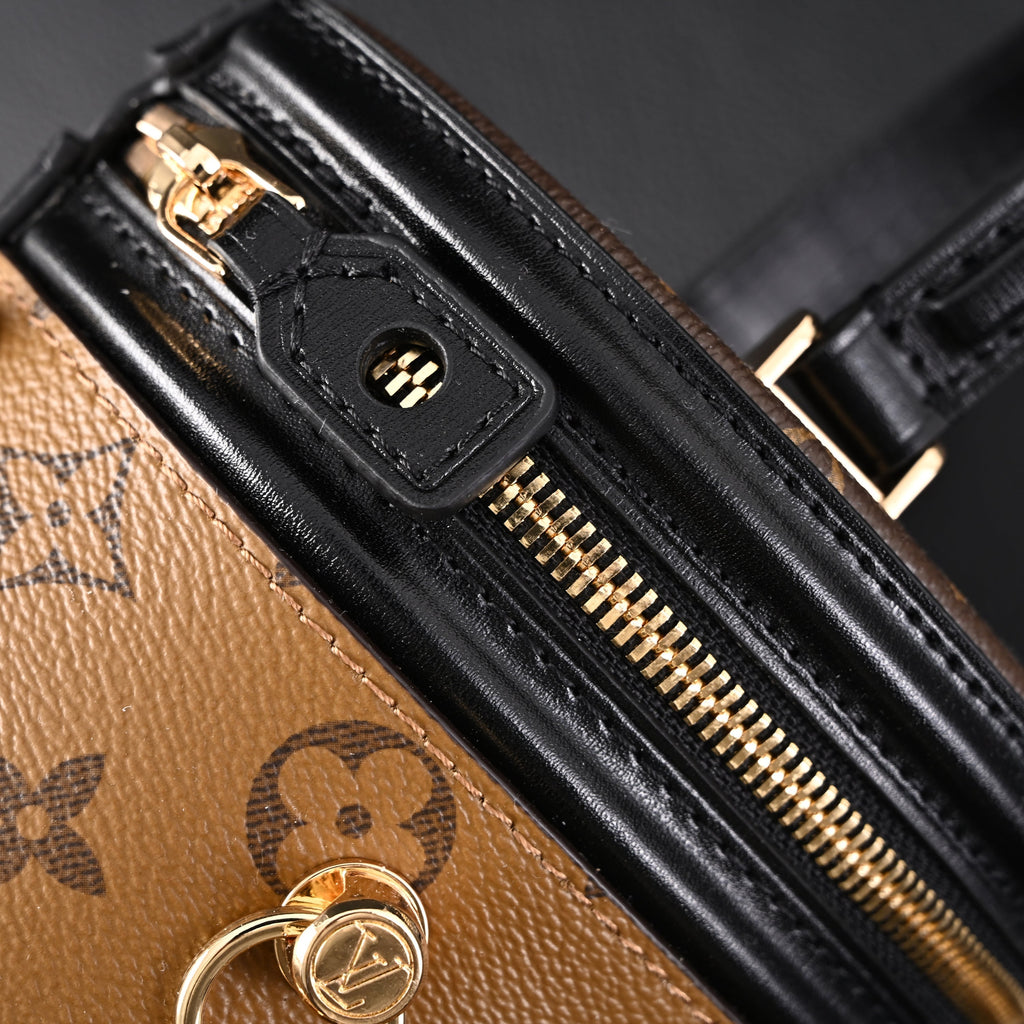 louis-vuitton-cannes-bag-monogram-canvas-vanity-case-with-top-handle-small Handle