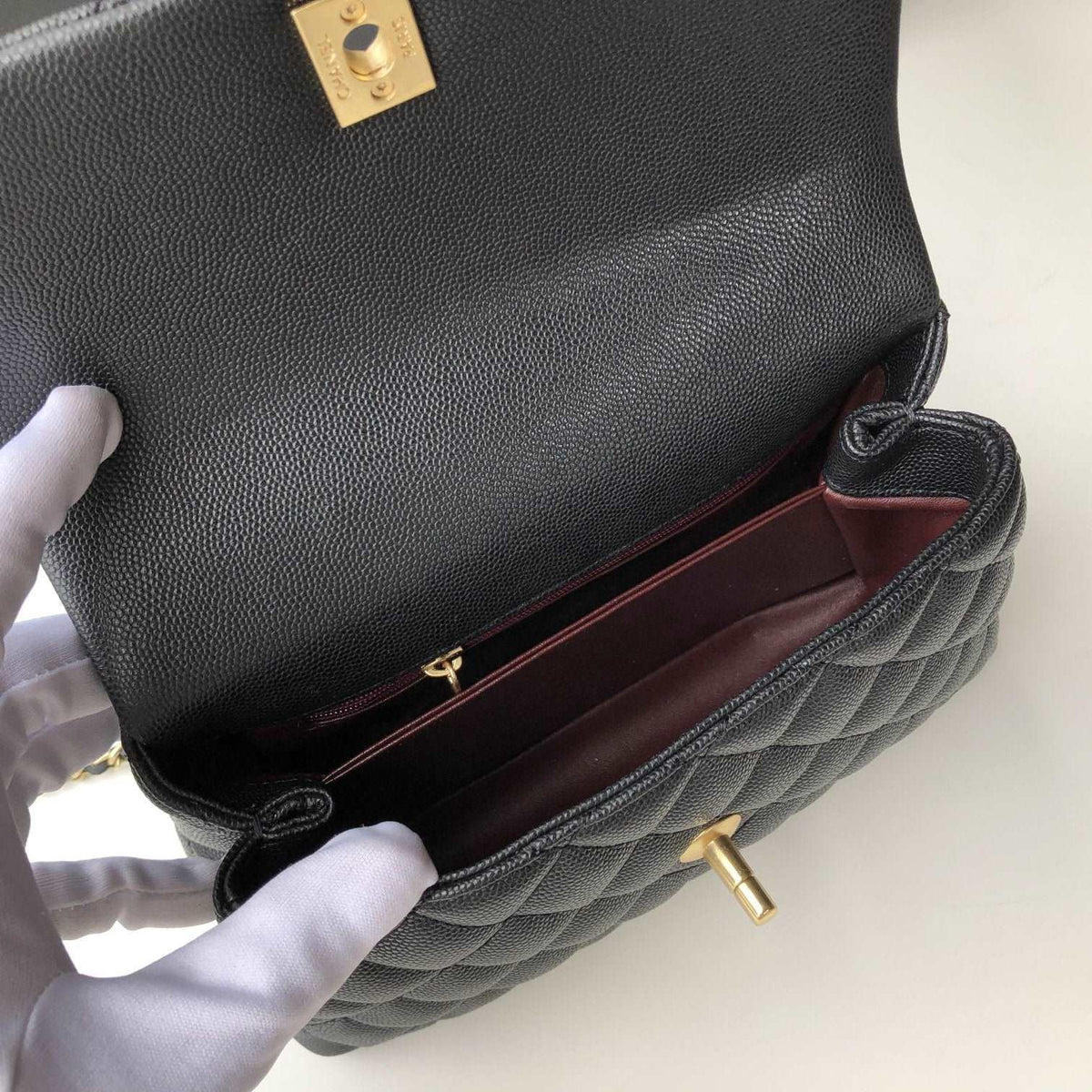 flap-bag-with-top-handle-7 Handle