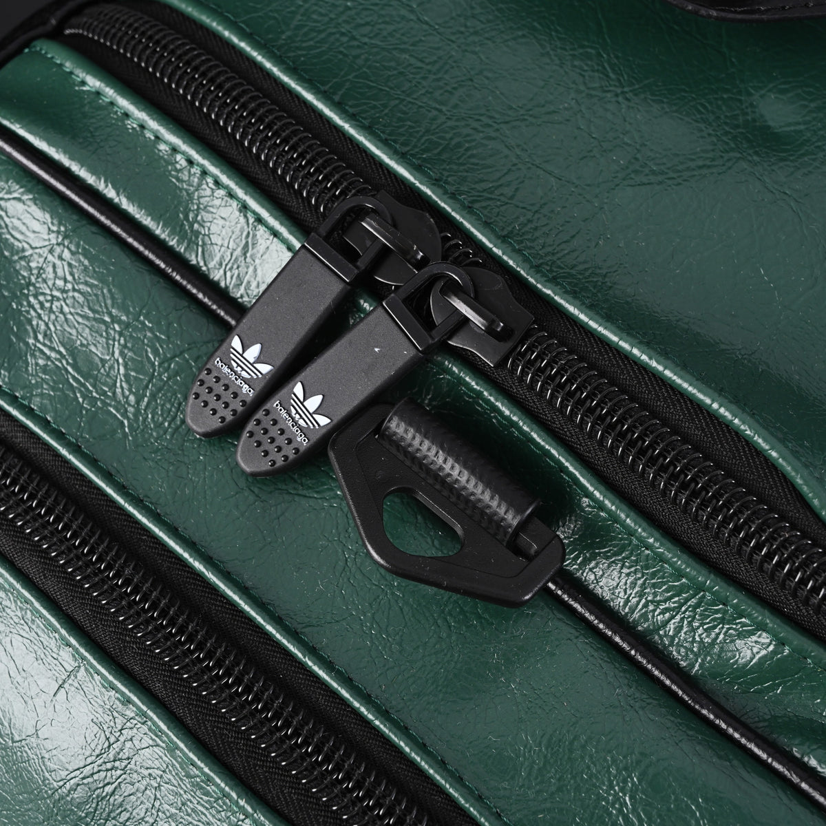 balenciaga-x-adidas-large-duffel-travel-bag-black-green-with-trefoil-logo-and-triple-stripes Handle