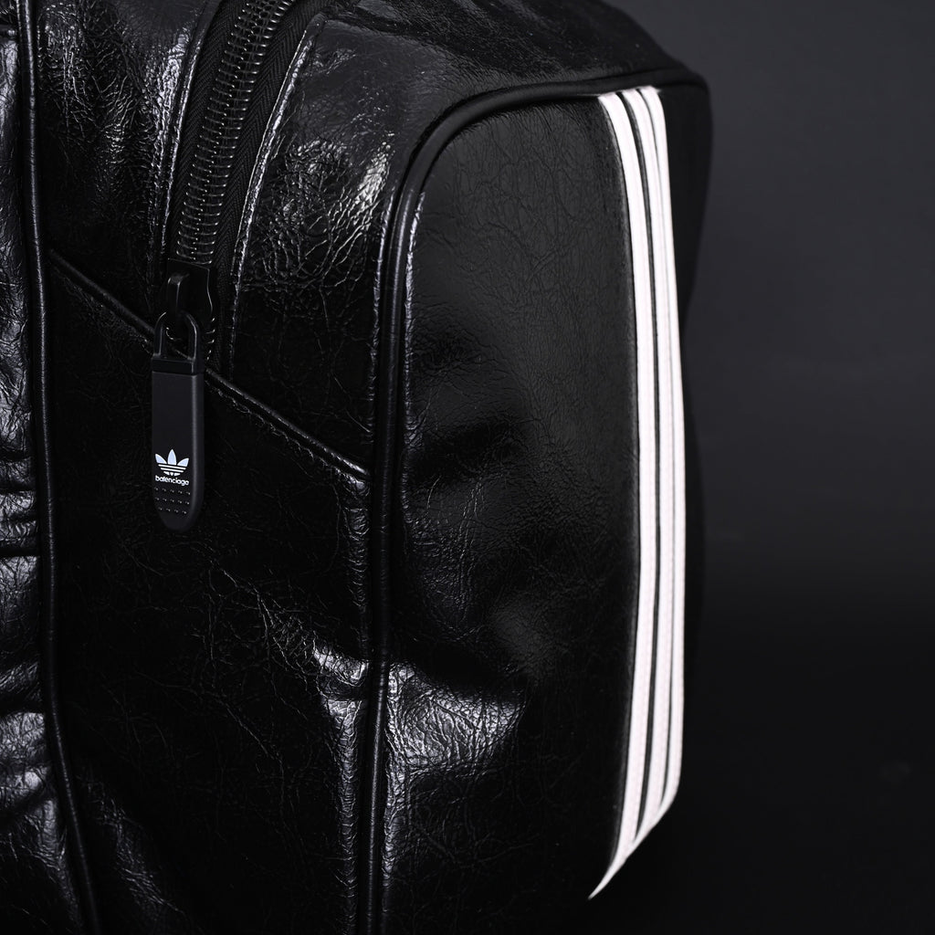 balenciaga-x-adidas-large-duffel-travel-bag-black-with-trefoil-logo-and-triple-stripes Handle