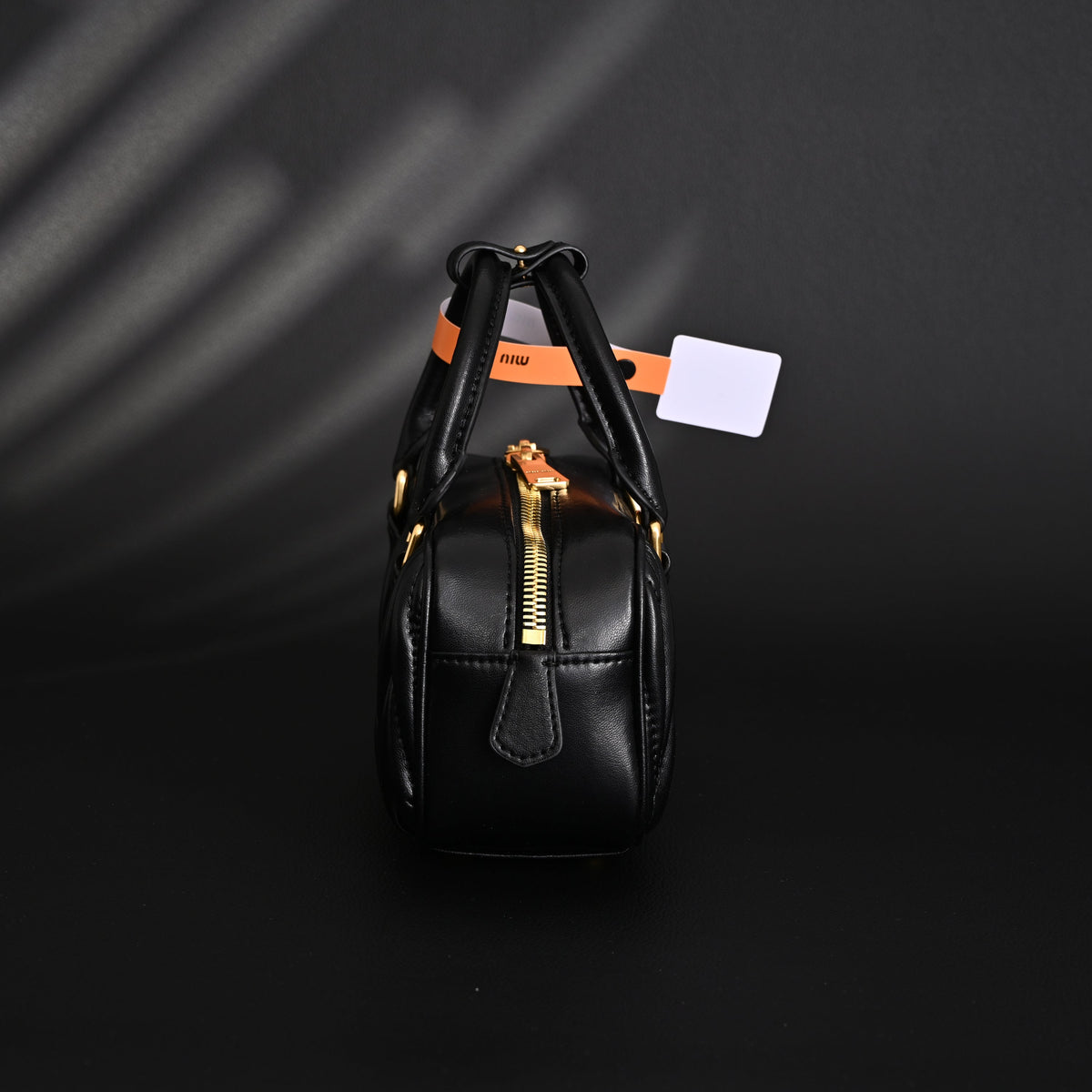 miu-miu-black-matelasse-leather-top-handle-bag Handle