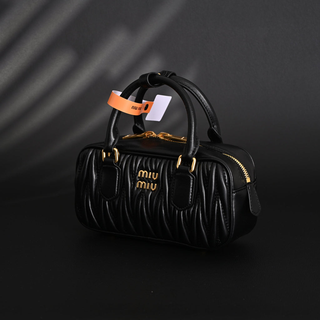 miu-miu-black-matelasse-leather-top-handle-bag Handle