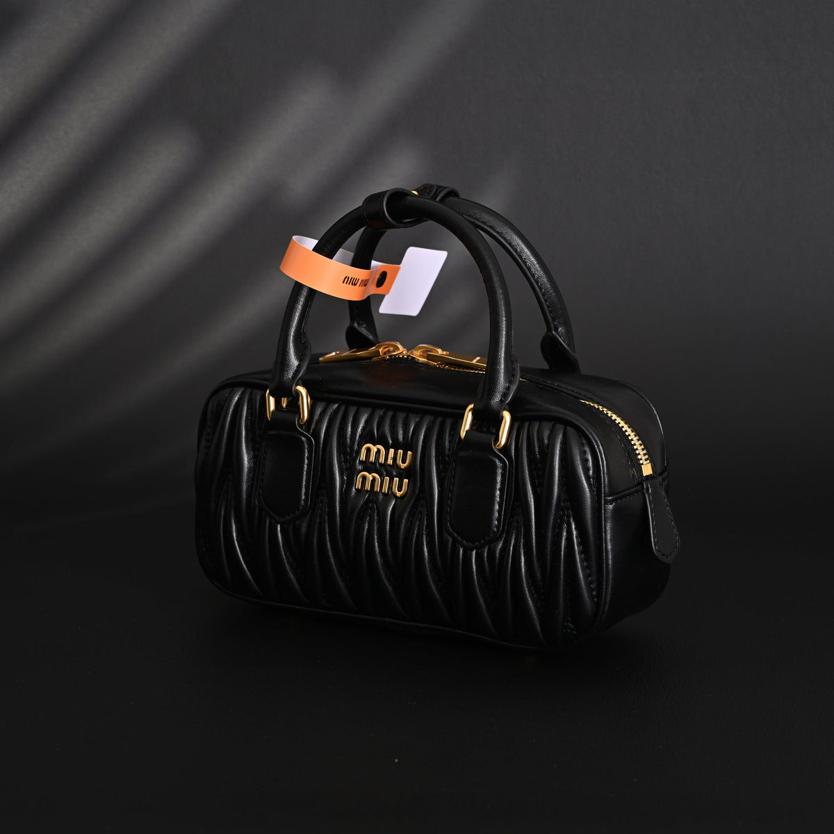 miu-miu-black-matelasse-leather-top-handle-bag Handle