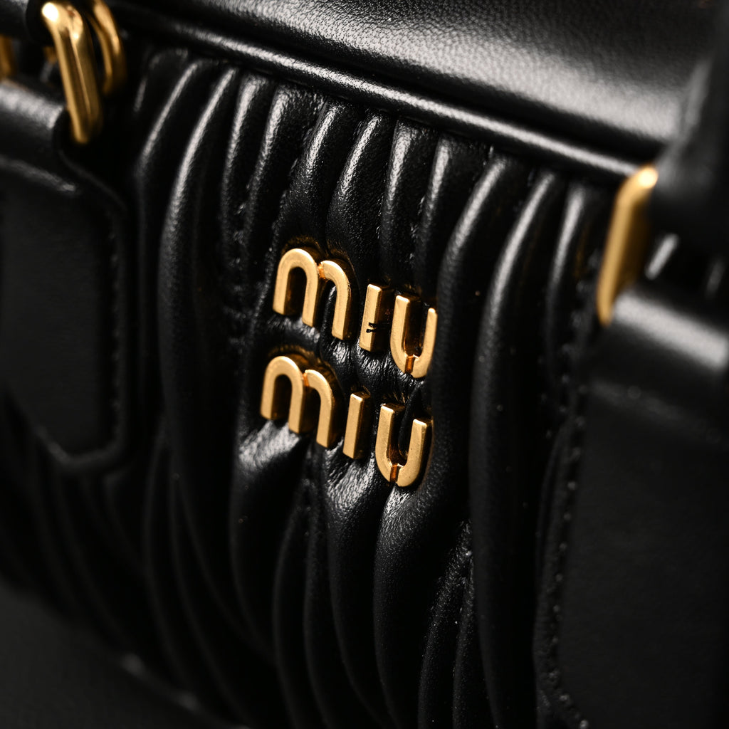 miu-miu-black-matelasse-leather-top-handle-bag Handle