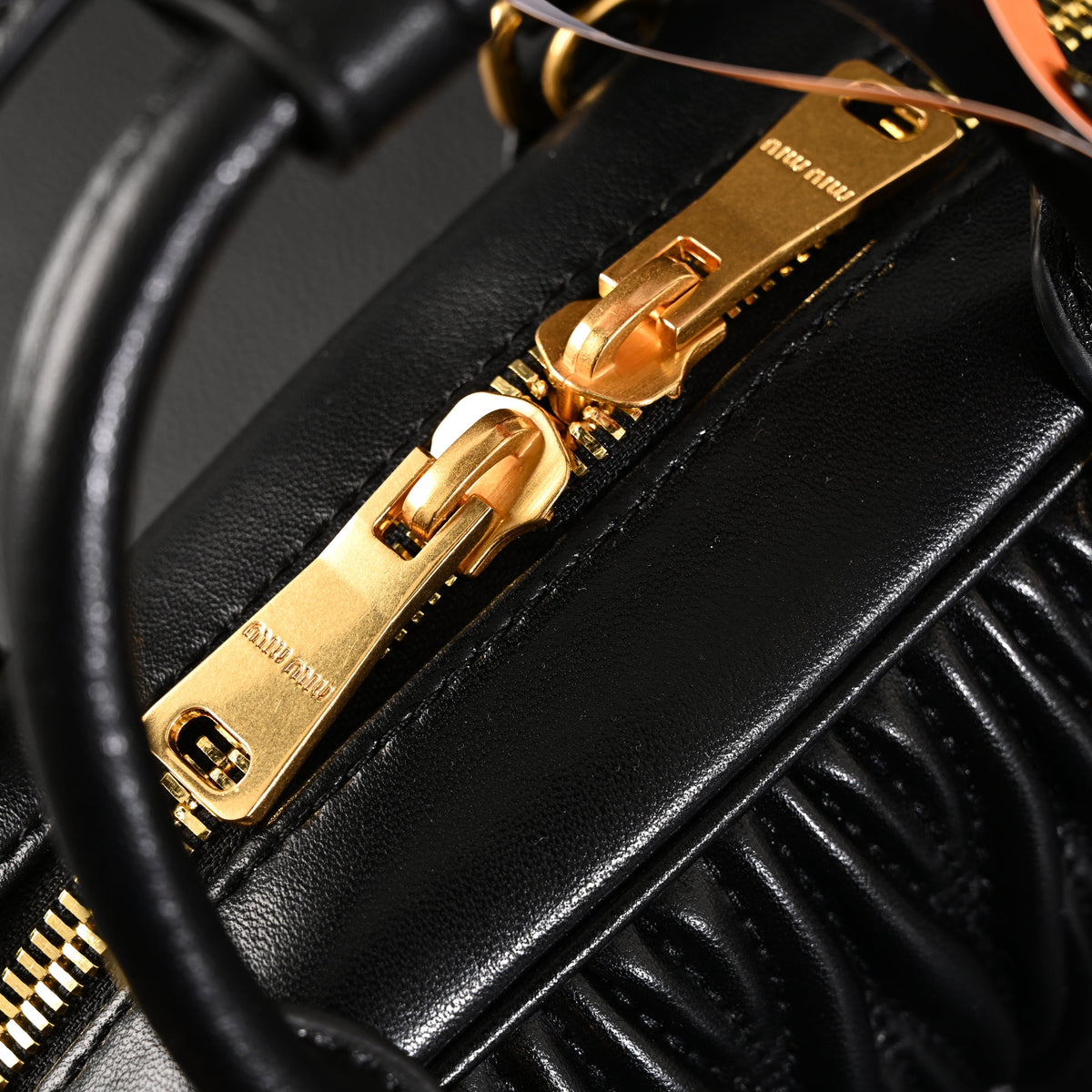 miu-miu-black-matelasse-leather-top-handle-bag Handle