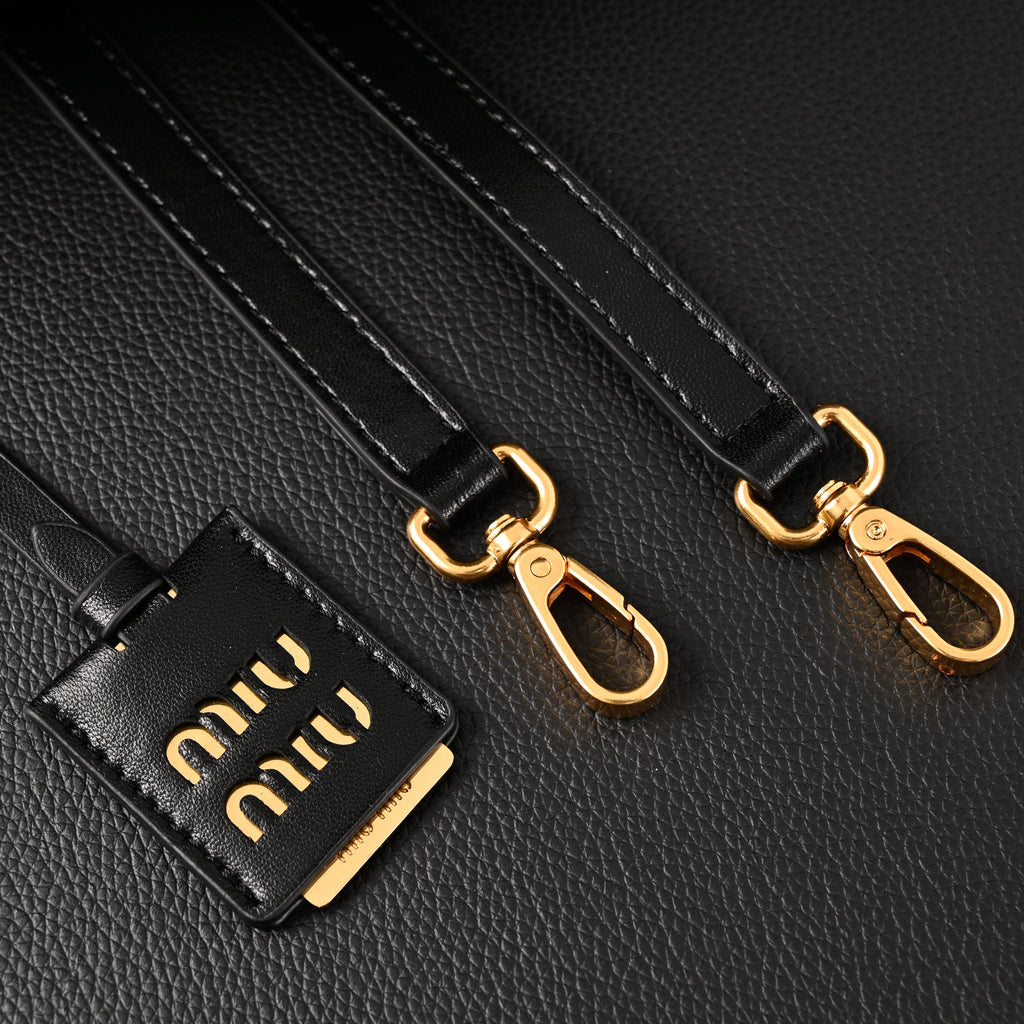 miu-miu-black-matelasse-leather-top-handle-bag Handle