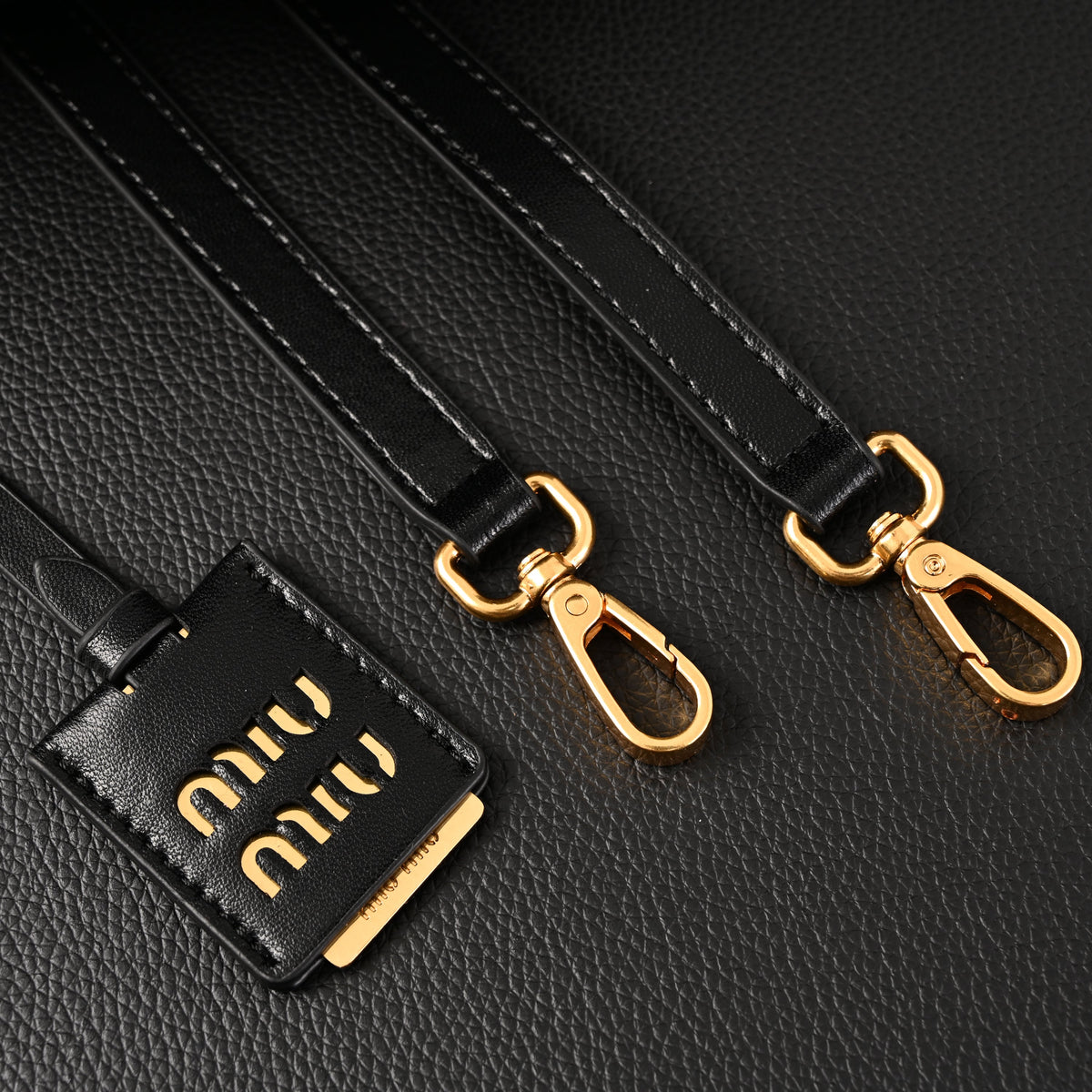miu-miu-black-matelasse-leather-top-handle-bag Handle