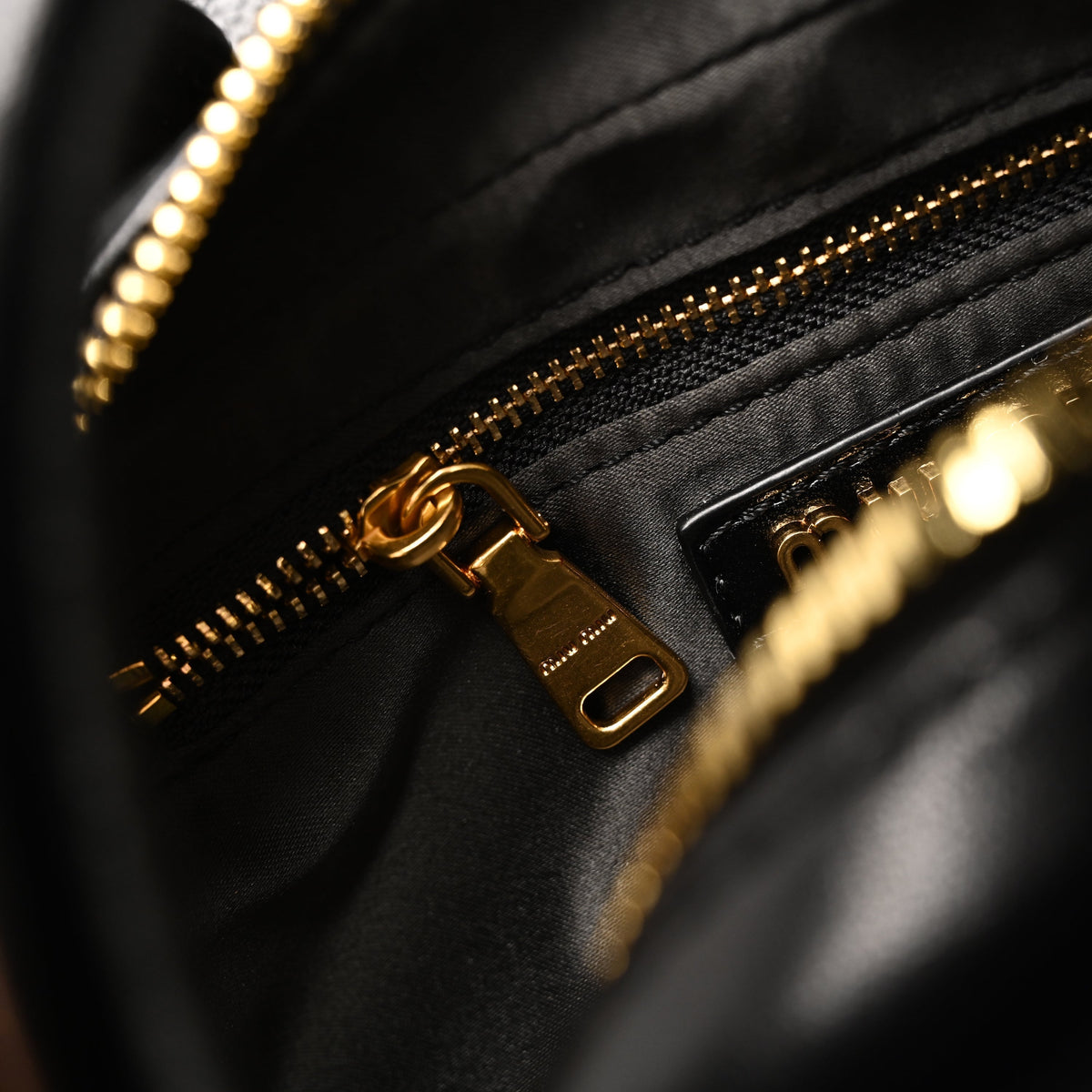 miu-miu-black-matelasse-leather-top-handle-bag Handle