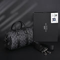 coach-signature-duffel-bag-black-monogram-canvas-with-leather-trim Handle