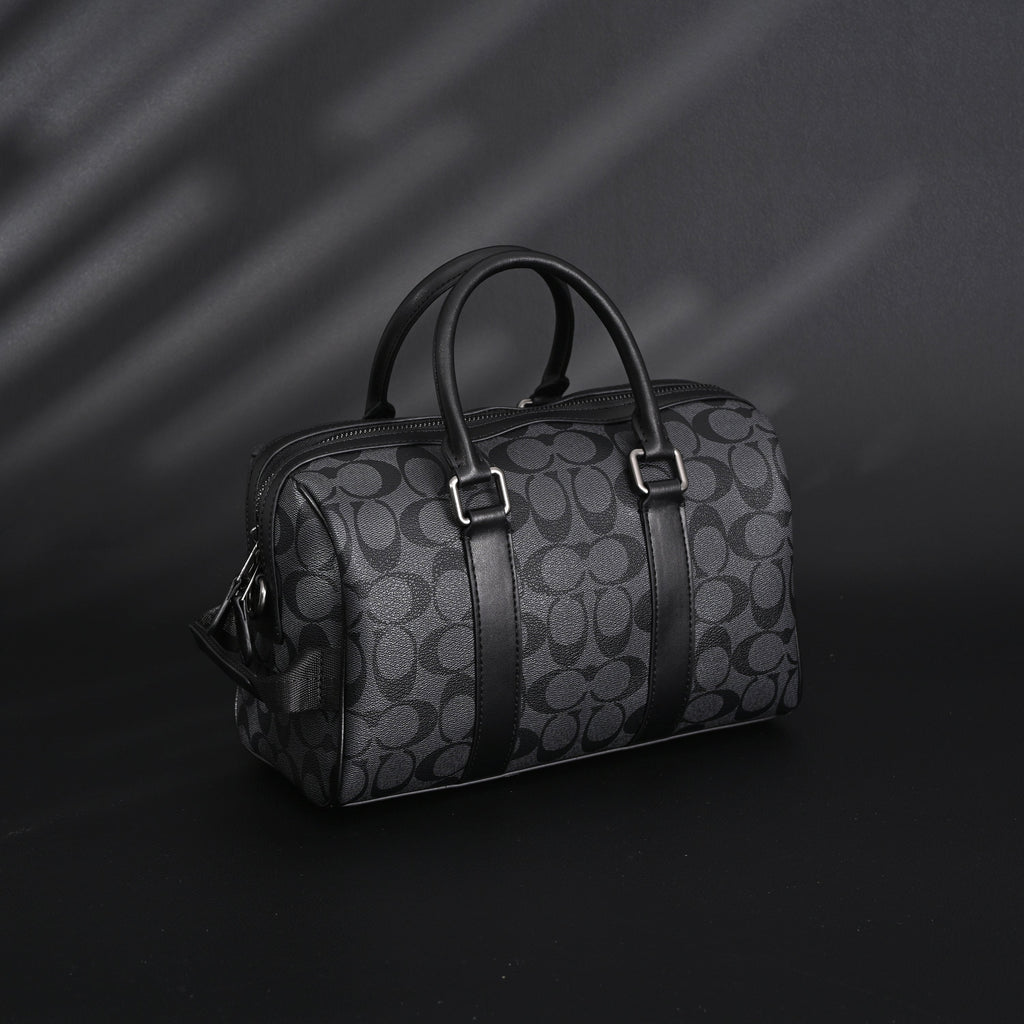 coach-signature-duffel-bag-black-monogram-canvas-with-leather-trim Handle