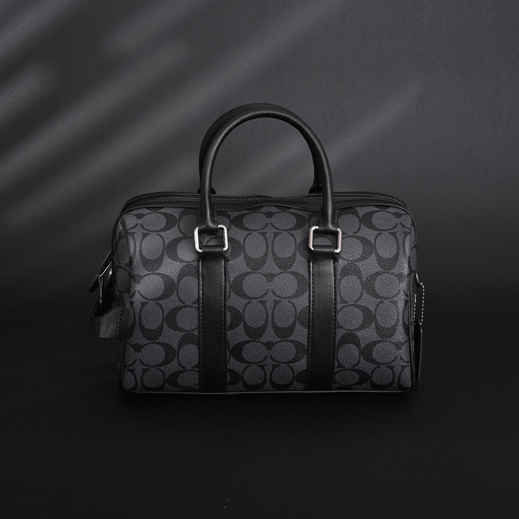 coach-signature-duffel-bag-black-monogram-canvas-with-leather-trim Handle