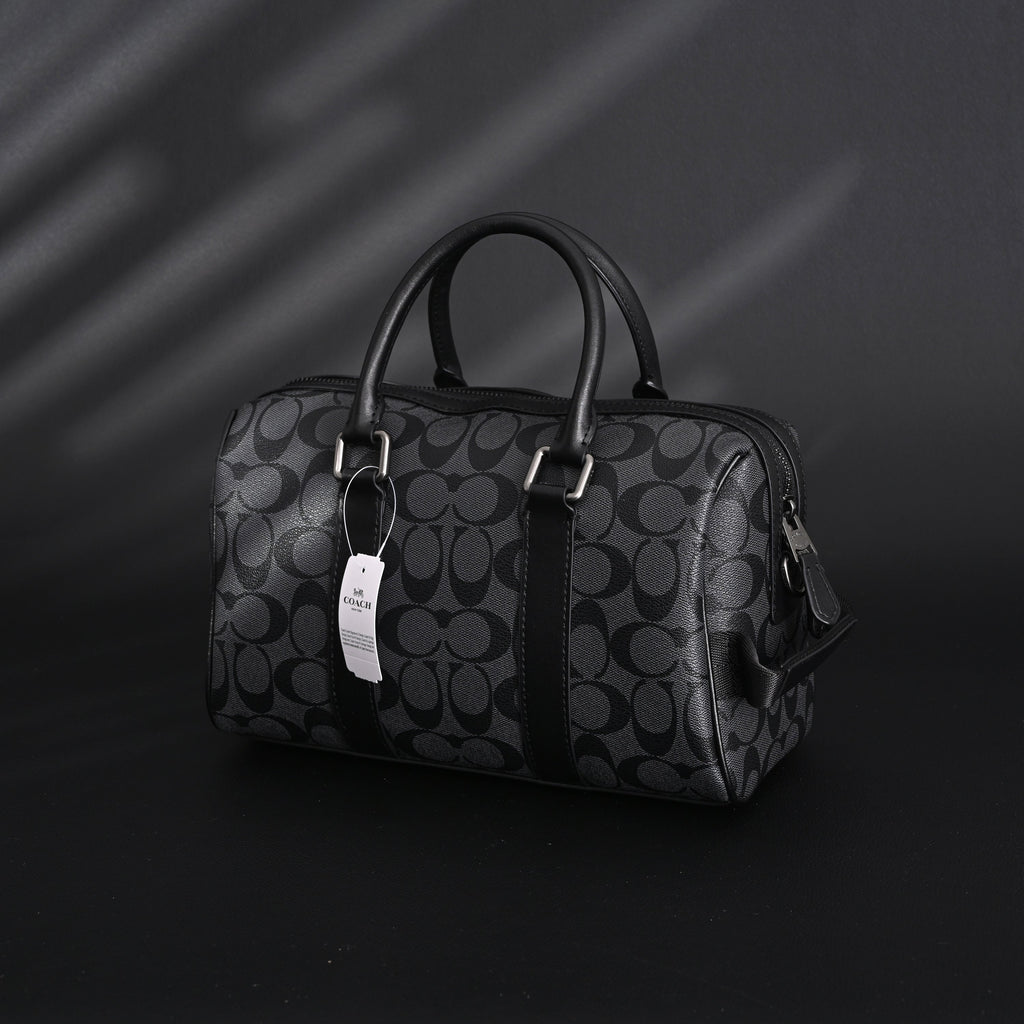 coach-signature-duffel-bag-black-monogram-canvas-with-leather-trim Handle