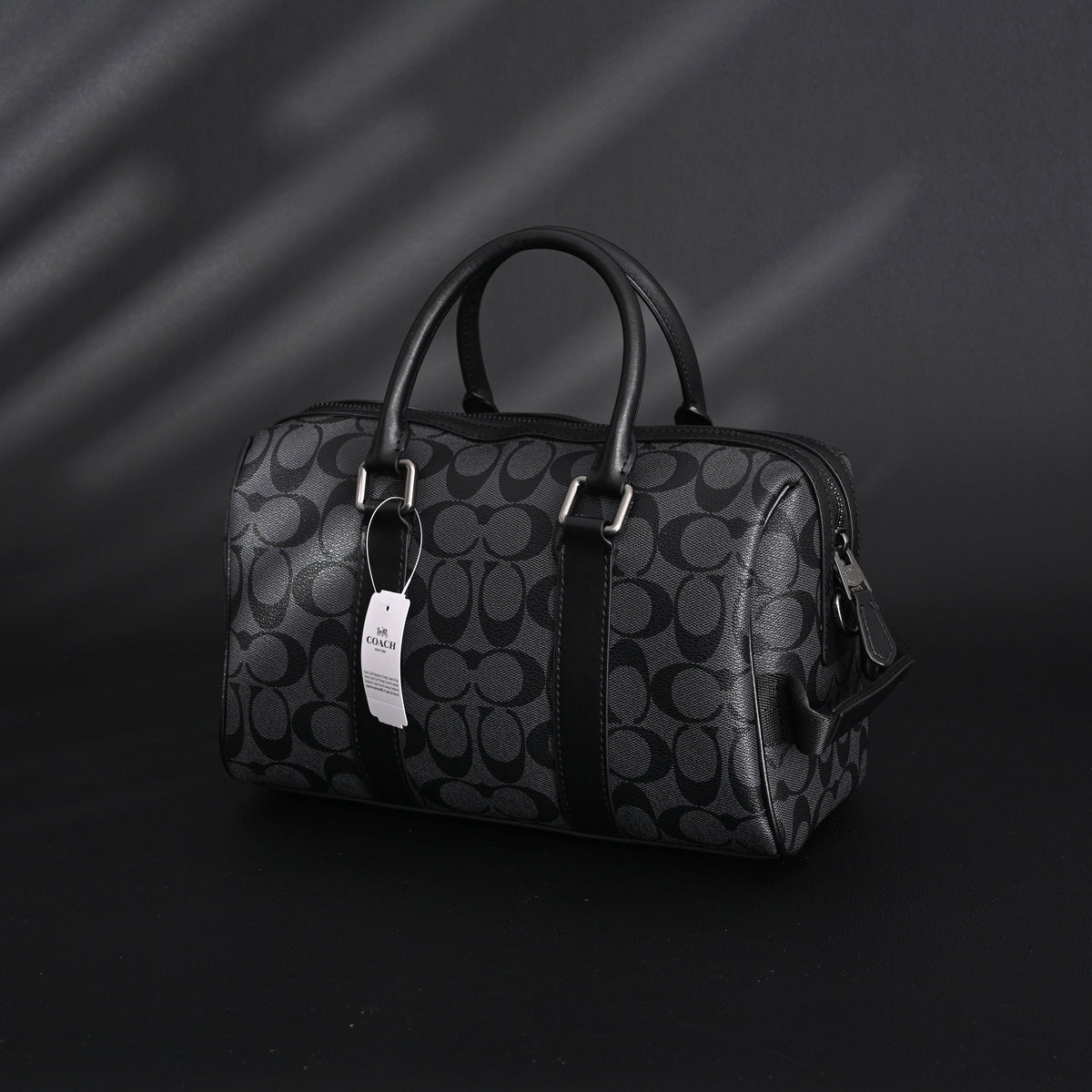 coach-signature-duffel-bag-black-monogram-canvas-with-leather-trim Handle
