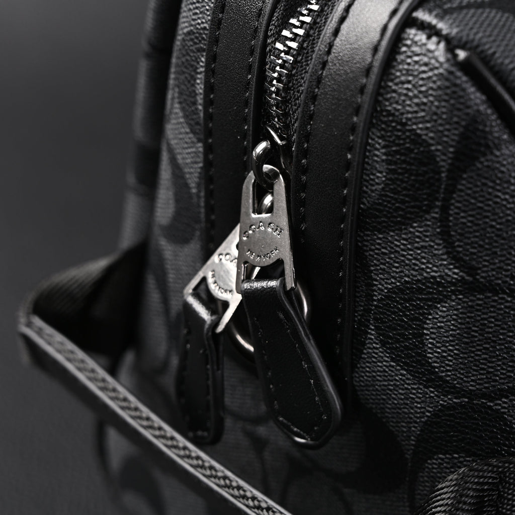 coach-signature-duffel-bag-black-monogram-canvas-with-leather-trim Handle