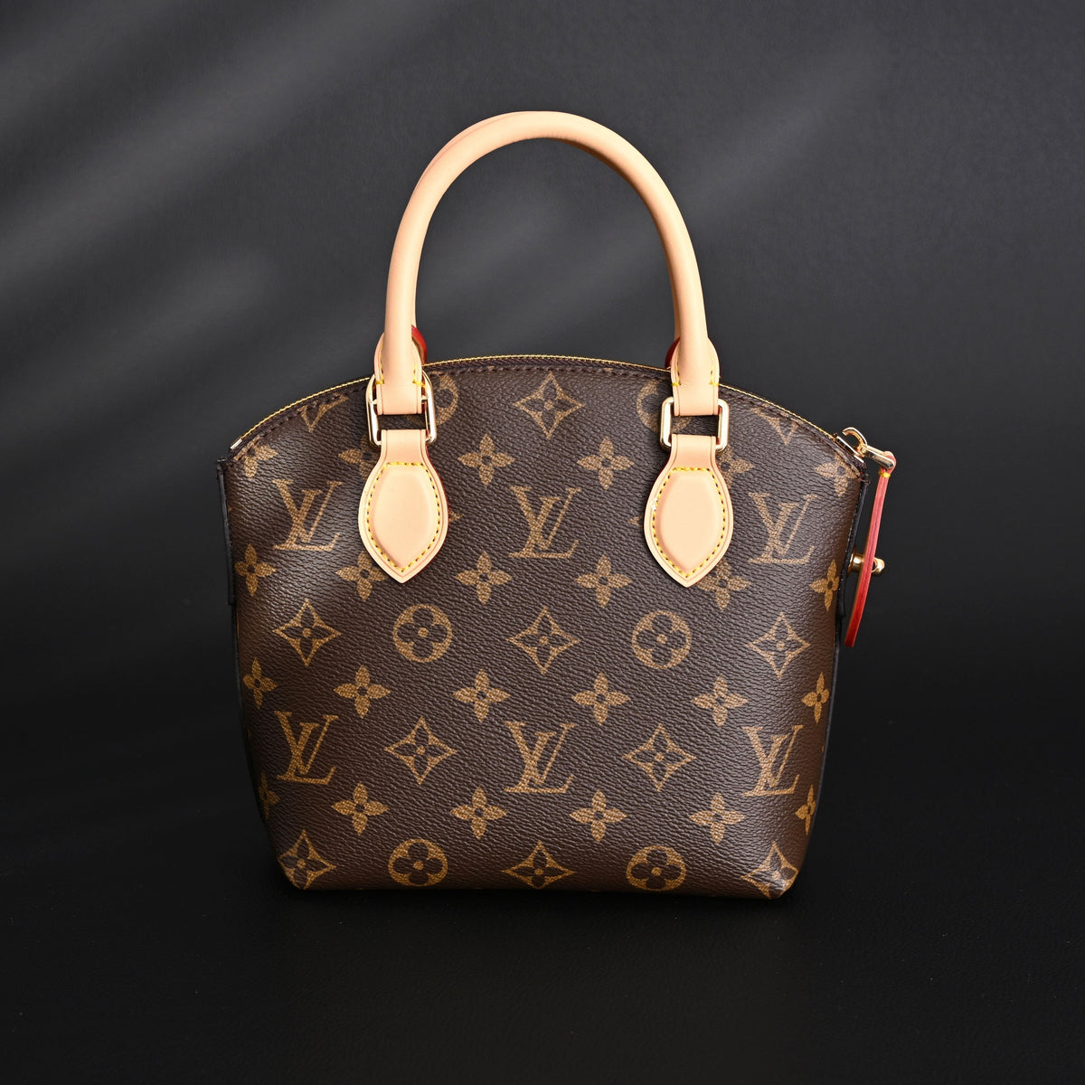 louis-vuitton-speedy-30-handbag-monogram-canvas-with-leather-trim Handle