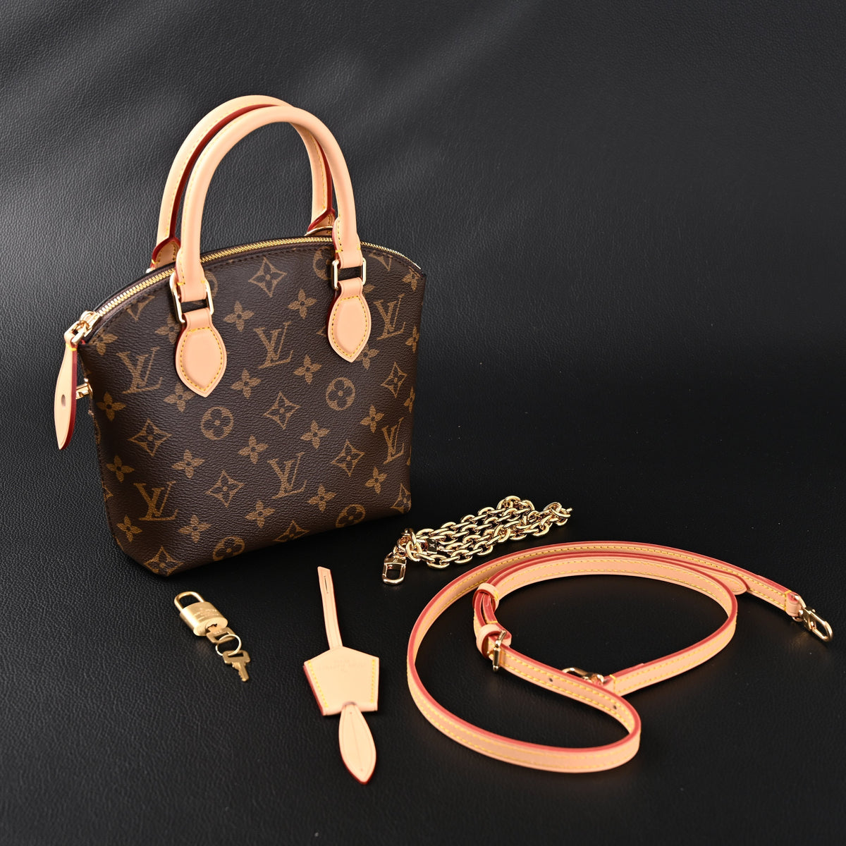 louis-vuitton-speedy-30-handbag-monogram-canvas-with-leather-trim Handle