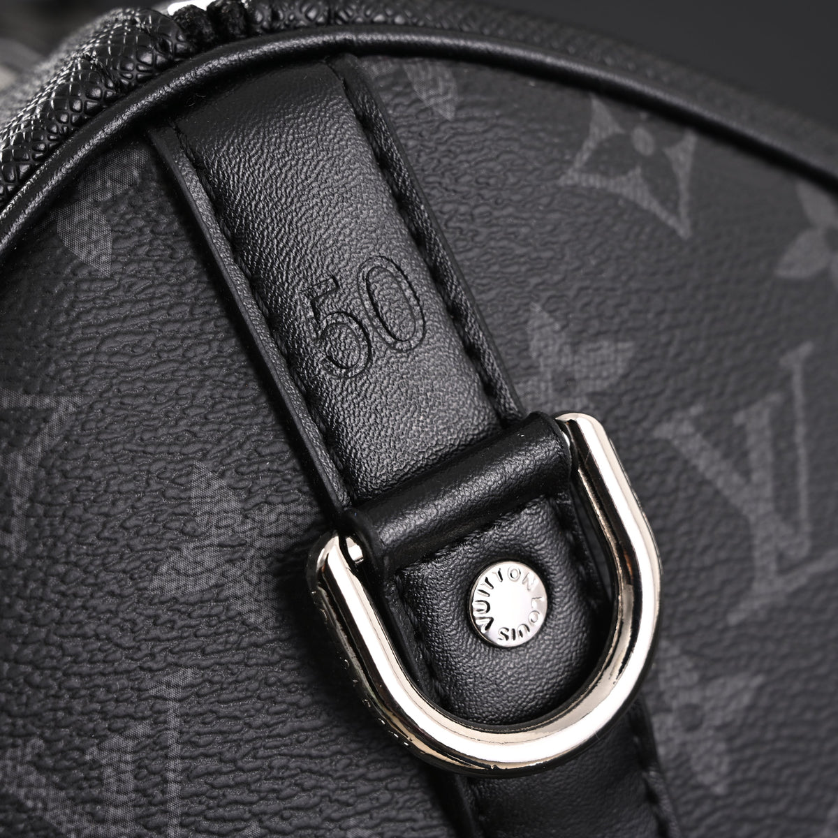 louis-vuitton-keepall-bandouliere-50-monogram-eclipse-canvas-travel-bag Handle