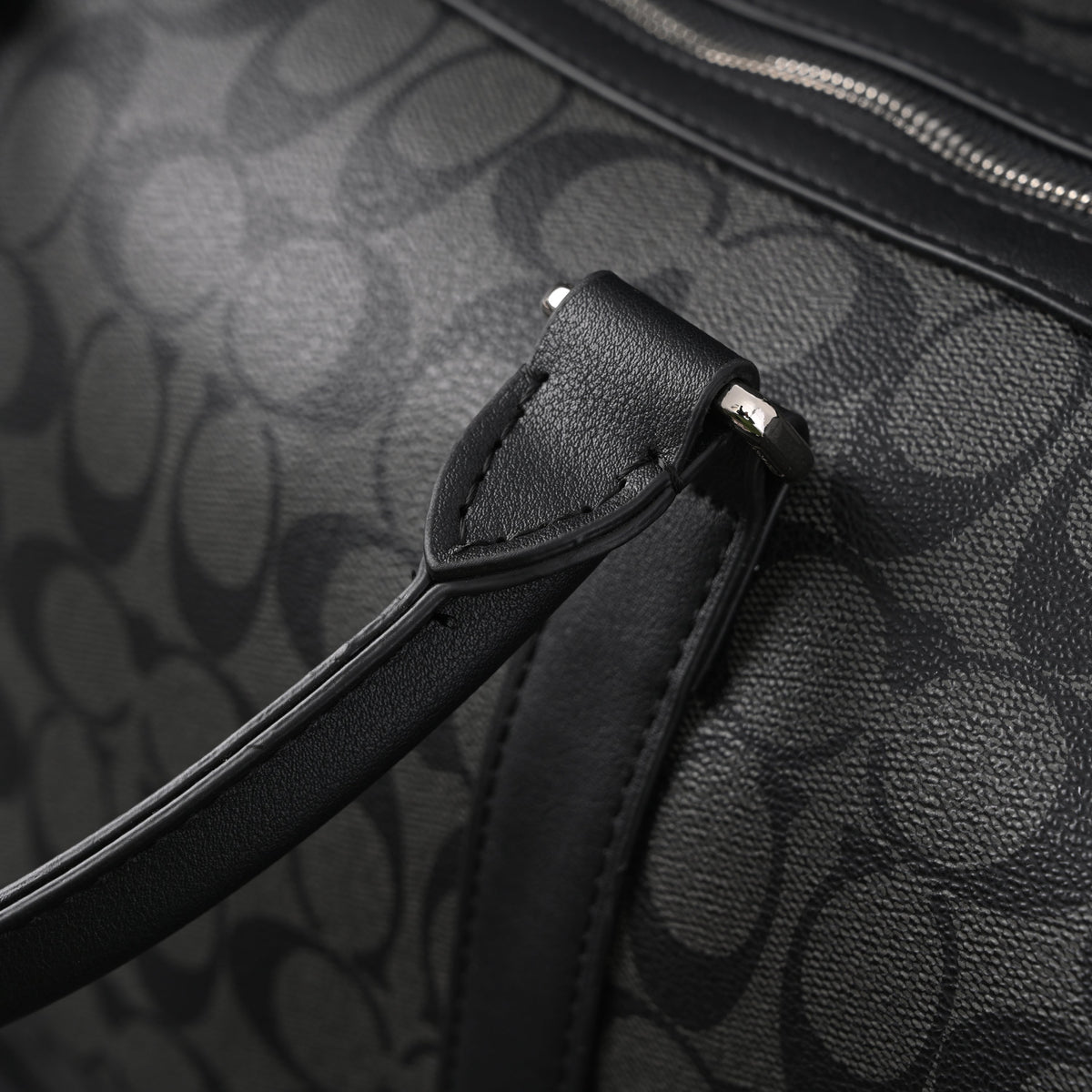 coach-metropolitan-duffel-bag-in-signature-black-canvas Handle