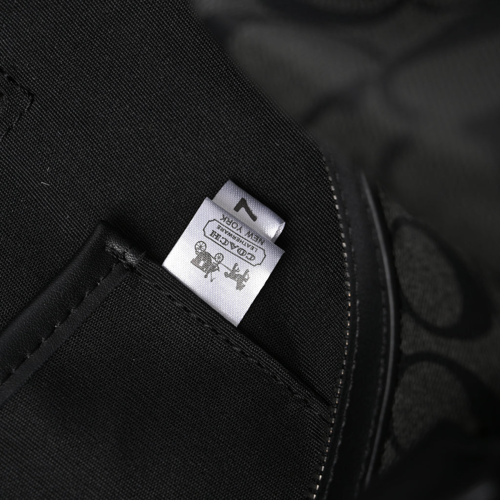 coach-metropolitan-duffel-bag-in-signature-black-canvas Handle