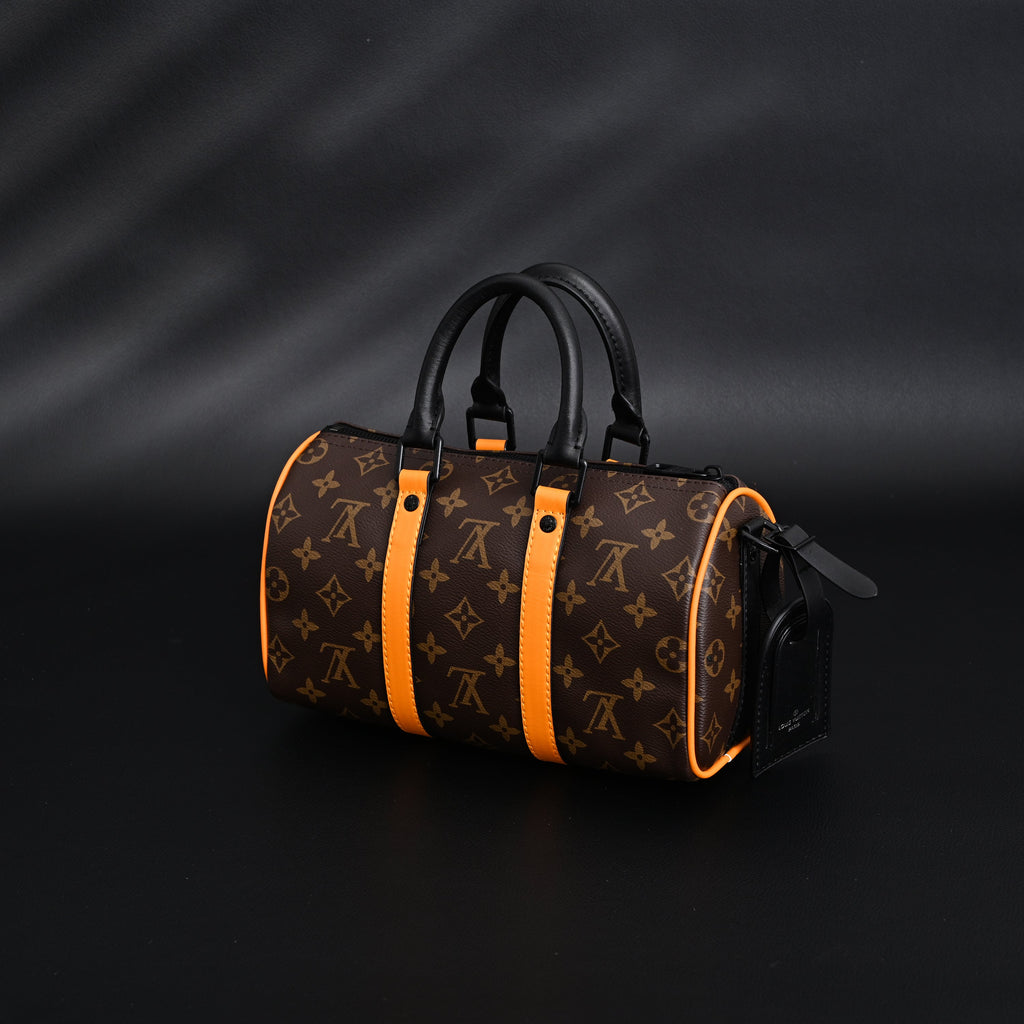 louis-vuitton-keepall-bandouliere-50-monogram-canvas-with-neon-orange-trim Handle