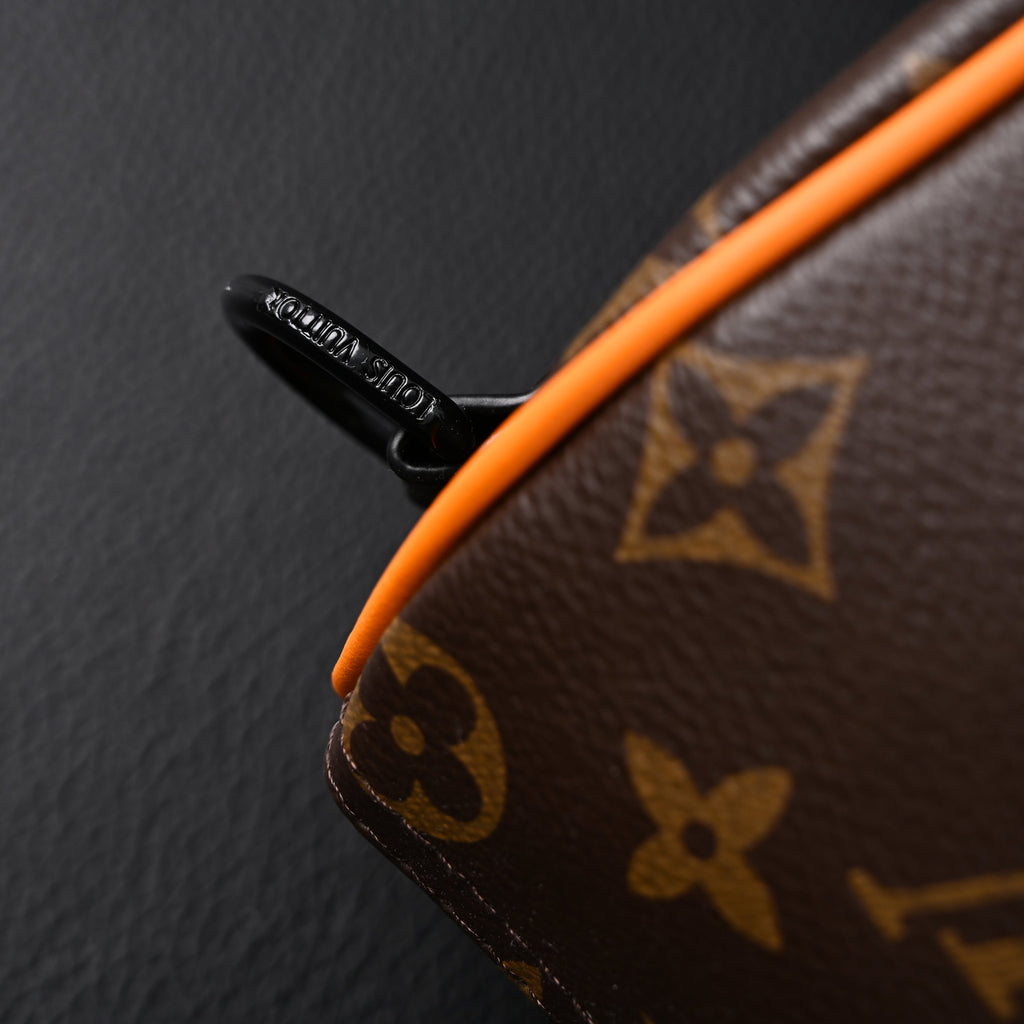 louis-vuitton-keepall-bandouliere-50-monogram-canvas-with-neon-orange-trim Handle