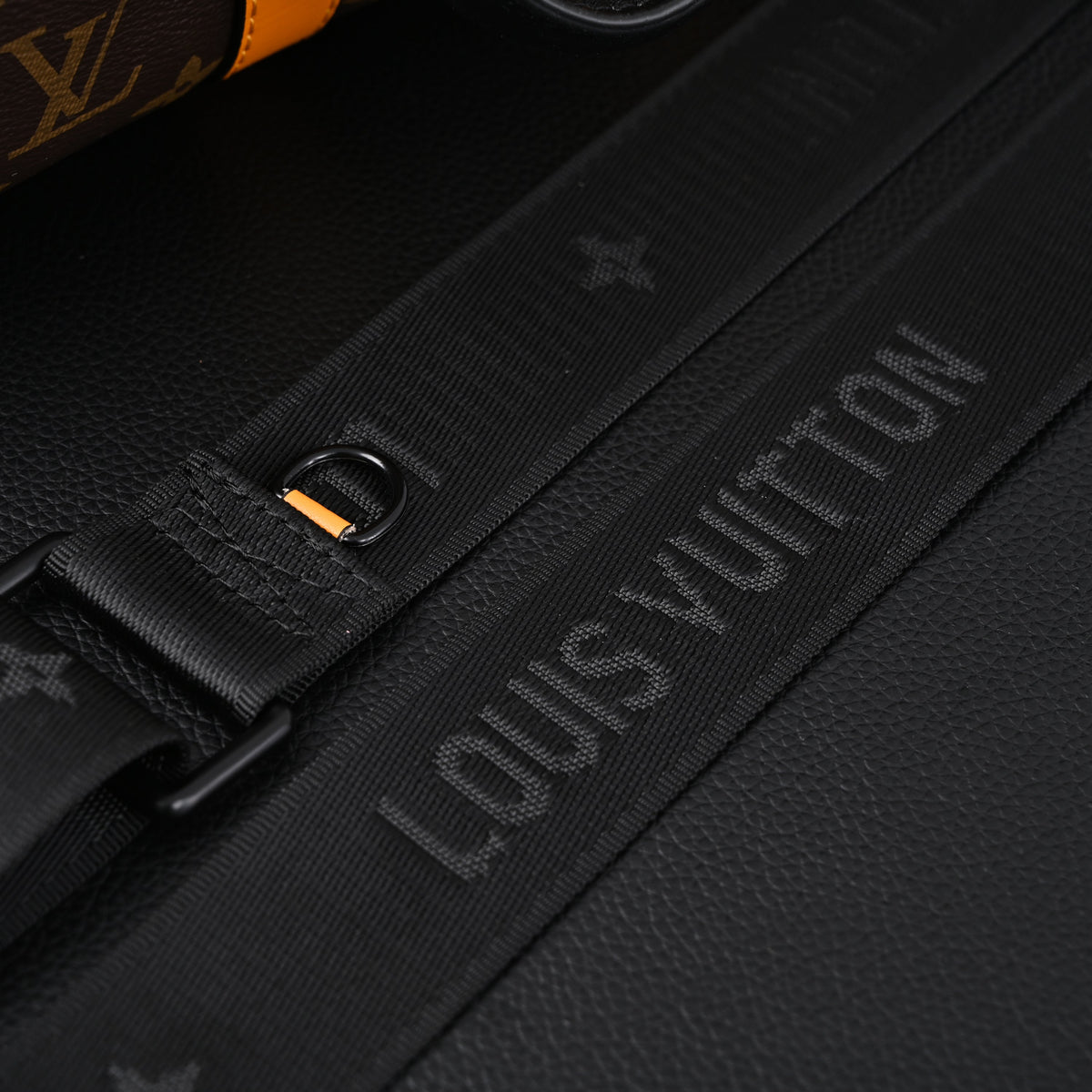 louis-vuitton-keepall-bandouliere-50-monogram-canvas-with-neon-orange-trim Handle