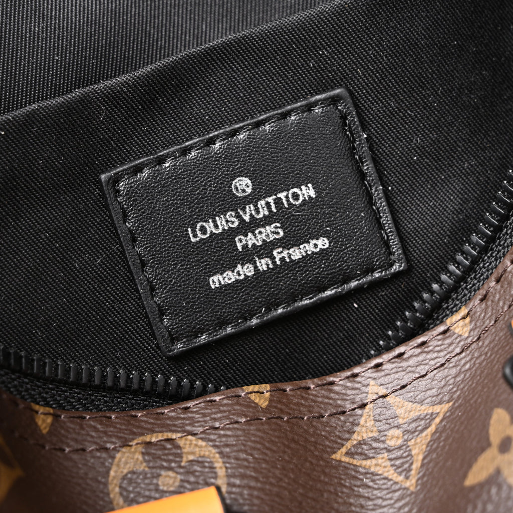 louis-vuitton-keepall-bandouliere-50-monogram-canvas-with-neon-orange-trim Handle