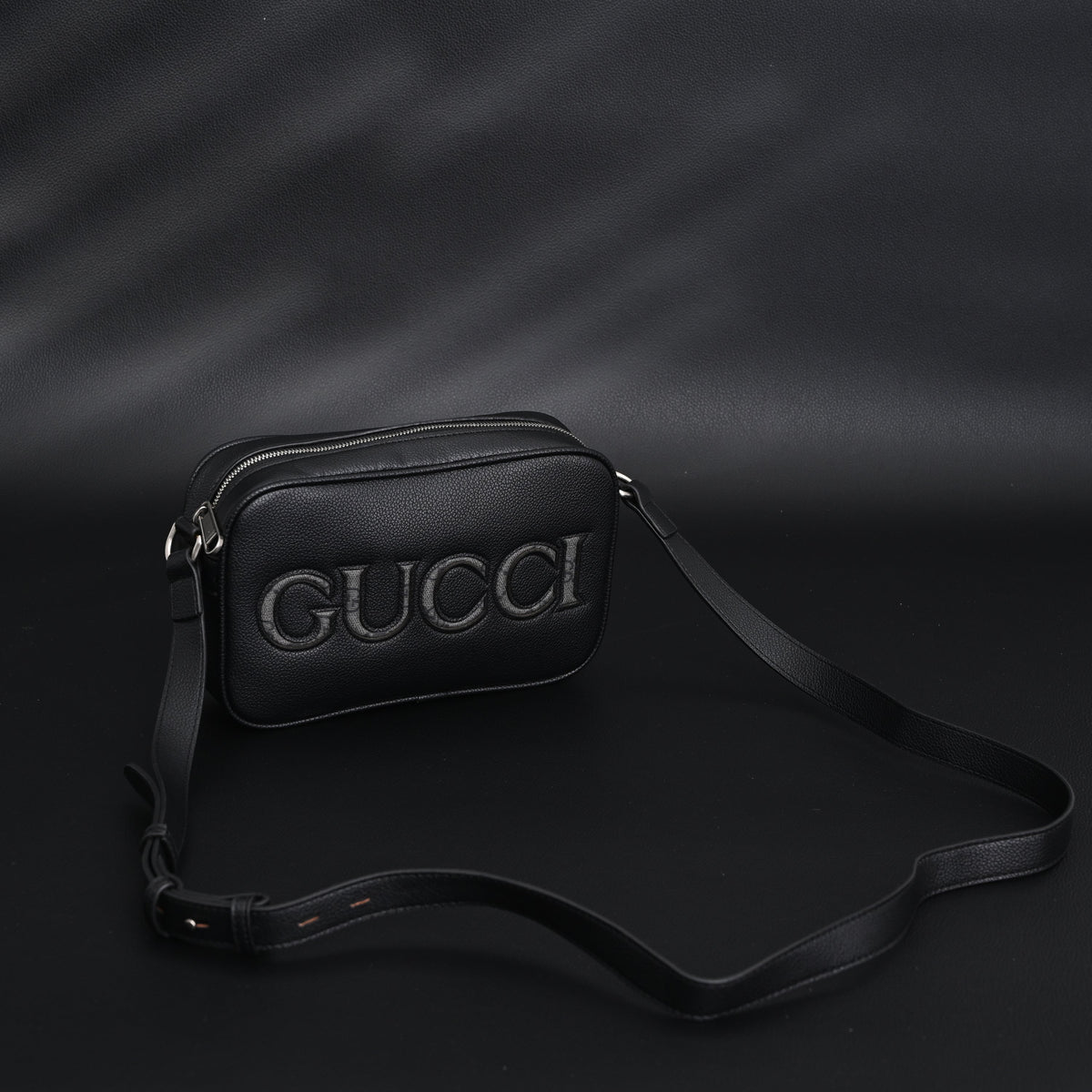gucci-black-leather-embossed-logo-belt-bag Crossbody