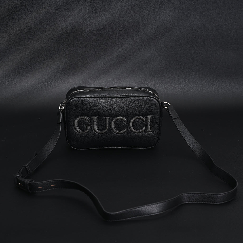 gucci-black-leather-embossed-logo-belt-bag Crossbody