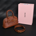 miu-miu-leather-bowler-top-handle-bag-cognac Handle