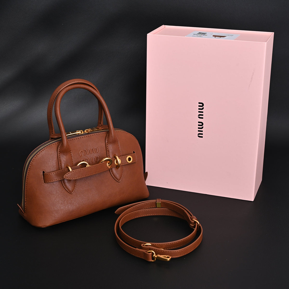 miu-miu-leather-bowler-top-handle-bag-cognac Handle