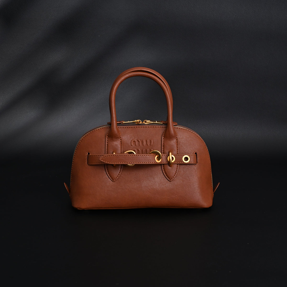 miu-miu-leather-bowler-top-handle-bag-cognac Handle