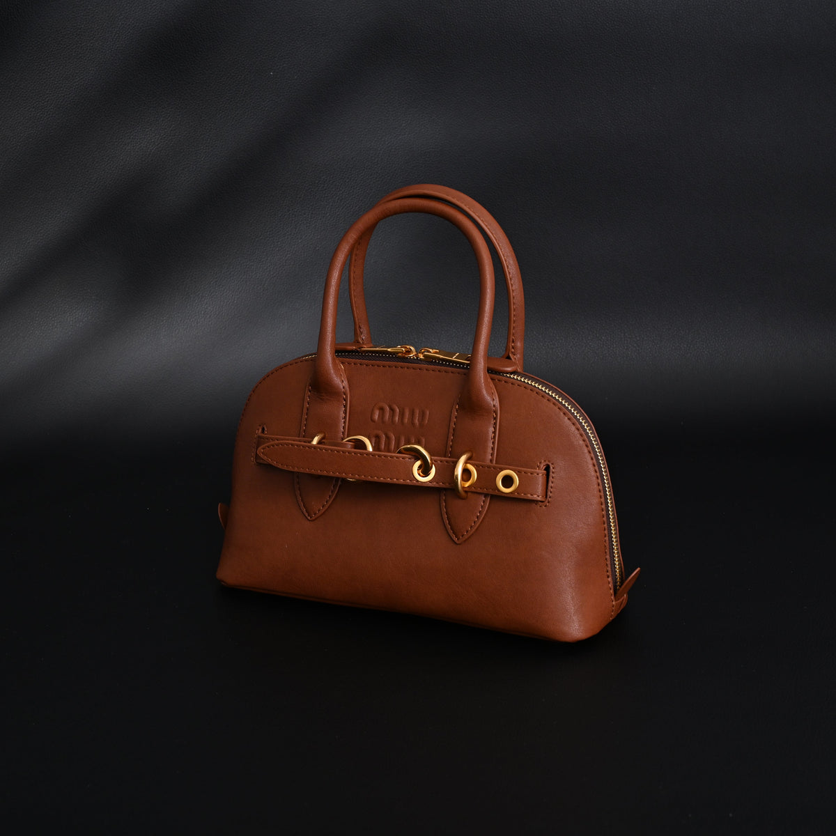 miu-miu-leather-bowler-top-handle-bag-cognac Handle