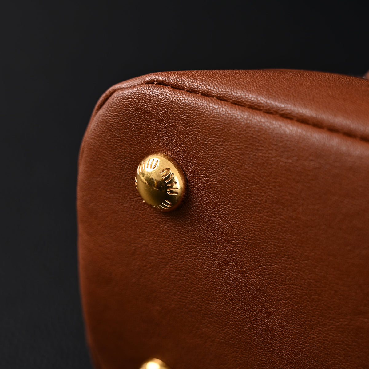 miu-miu-leather-bowler-top-handle-bag-cognac Handle