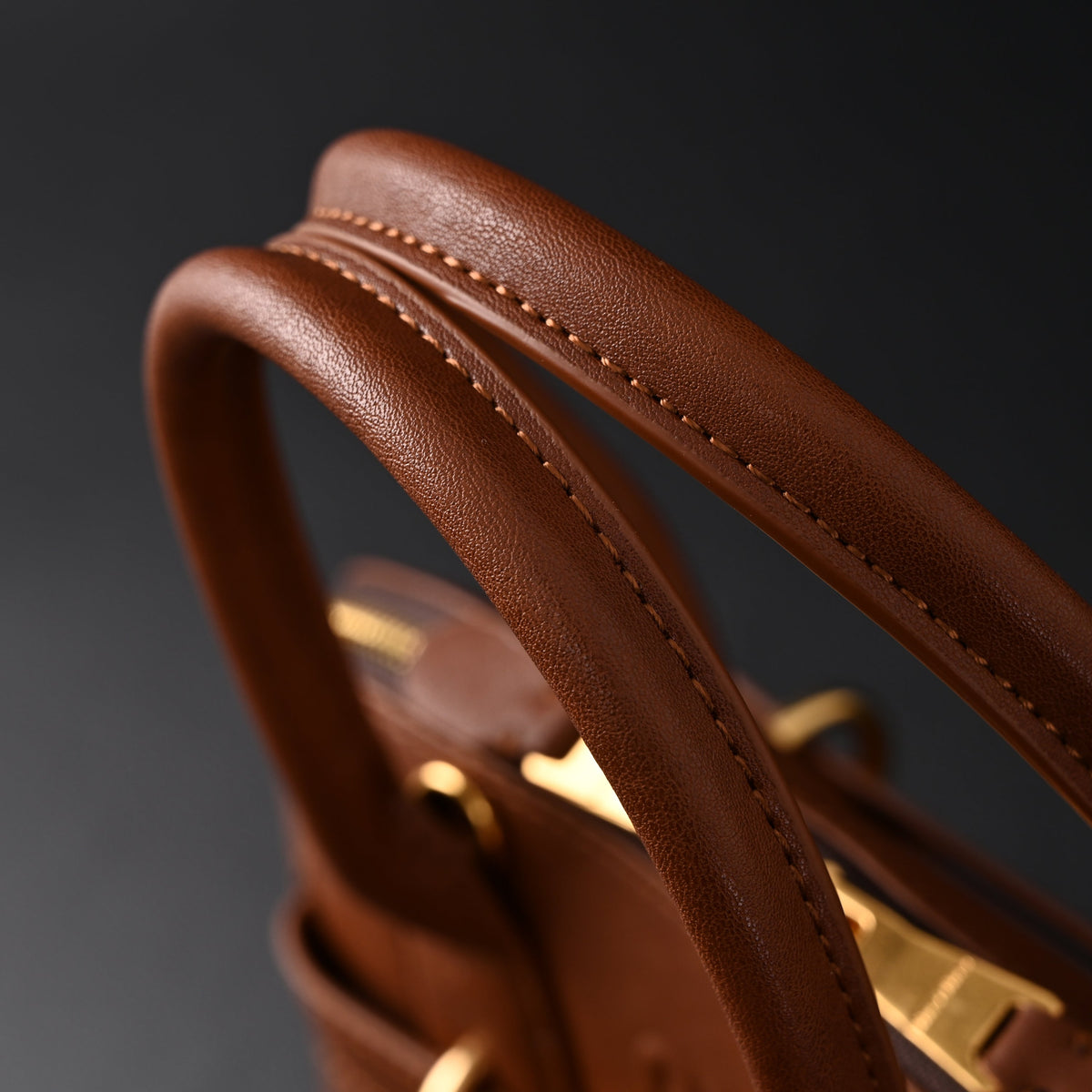 miu-miu-leather-bowler-top-handle-bag-cognac Handle