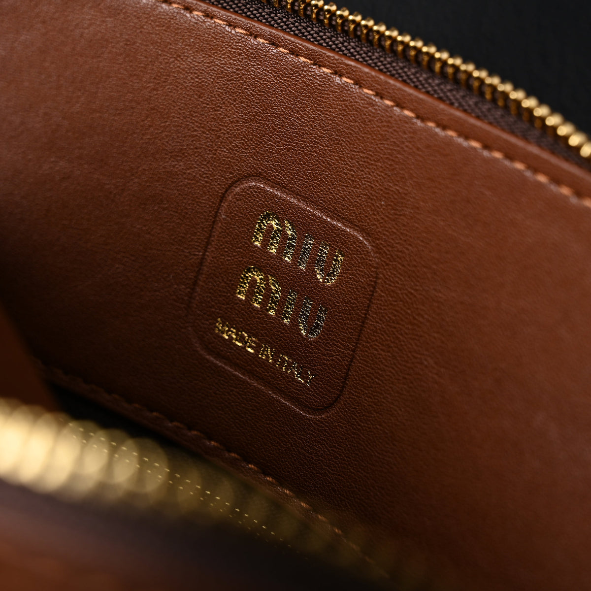 miu-miu-leather-bowler-top-handle-bag-cognac Handle