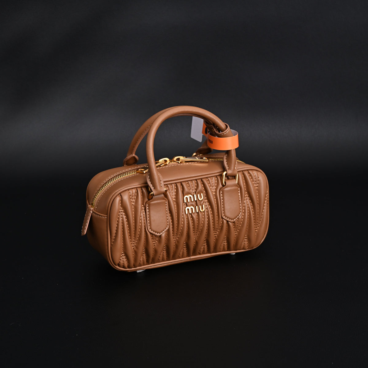 miu-miu-matelasse-leather-top-handle-bag-caramel-brown Handle