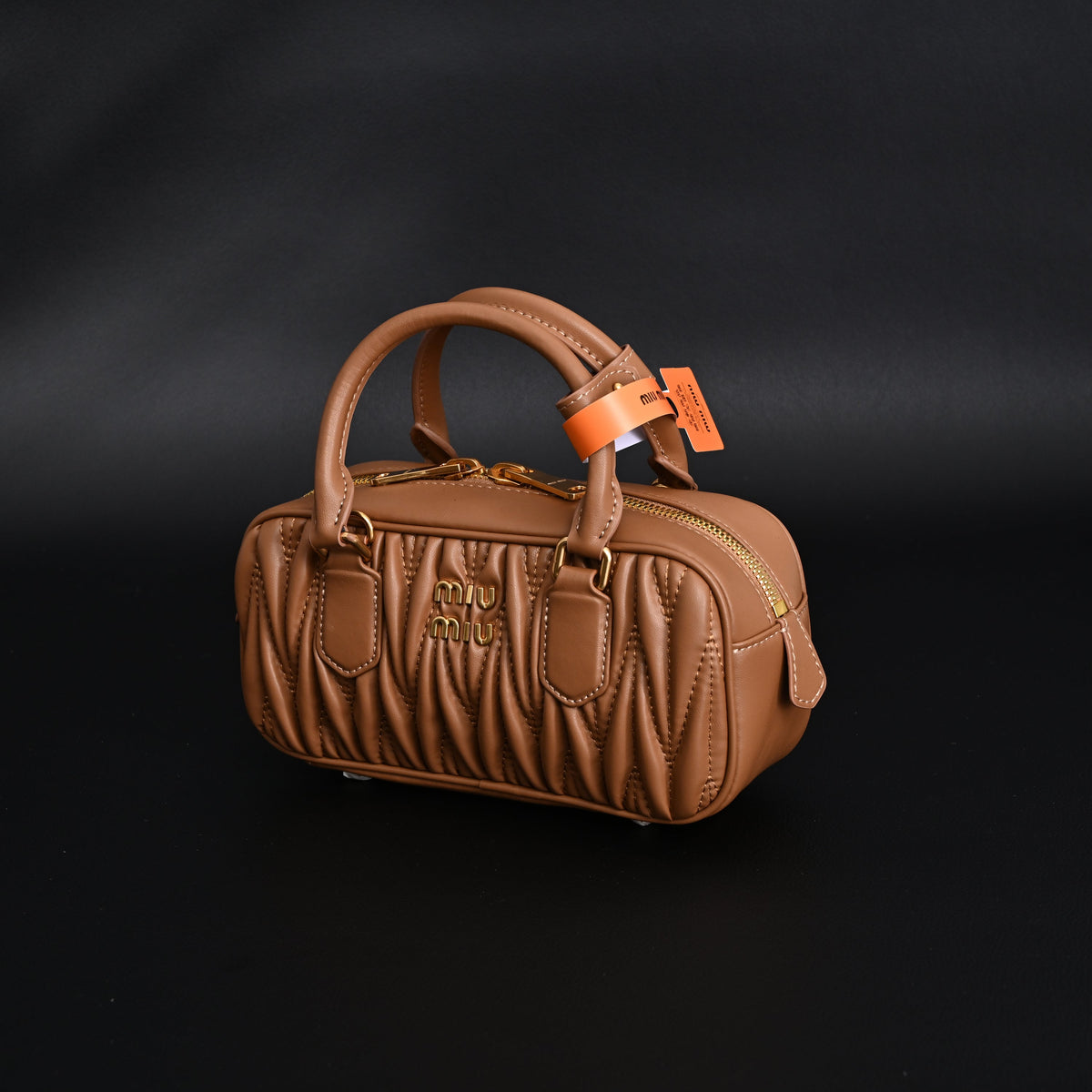 miu-miu-matelasse-leather-top-handle-bag-caramel-brown Handle
