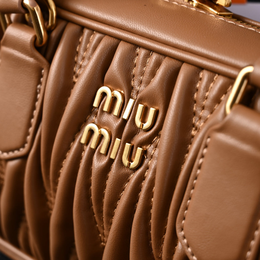 miu-miu-matelasse-leather-top-handle-bag-caramel-brown Handle