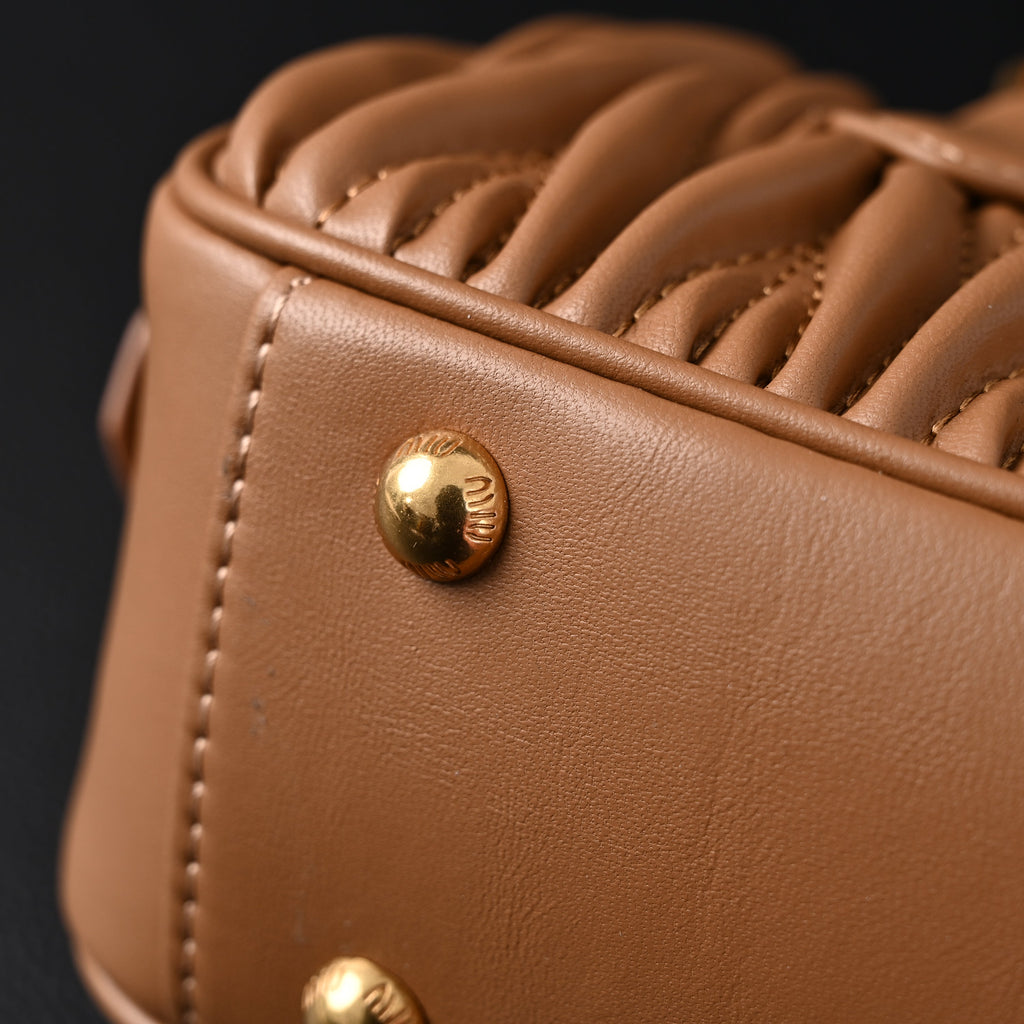 miu-miu-matelasse-leather-top-handle-bag-caramel-brown Handle
